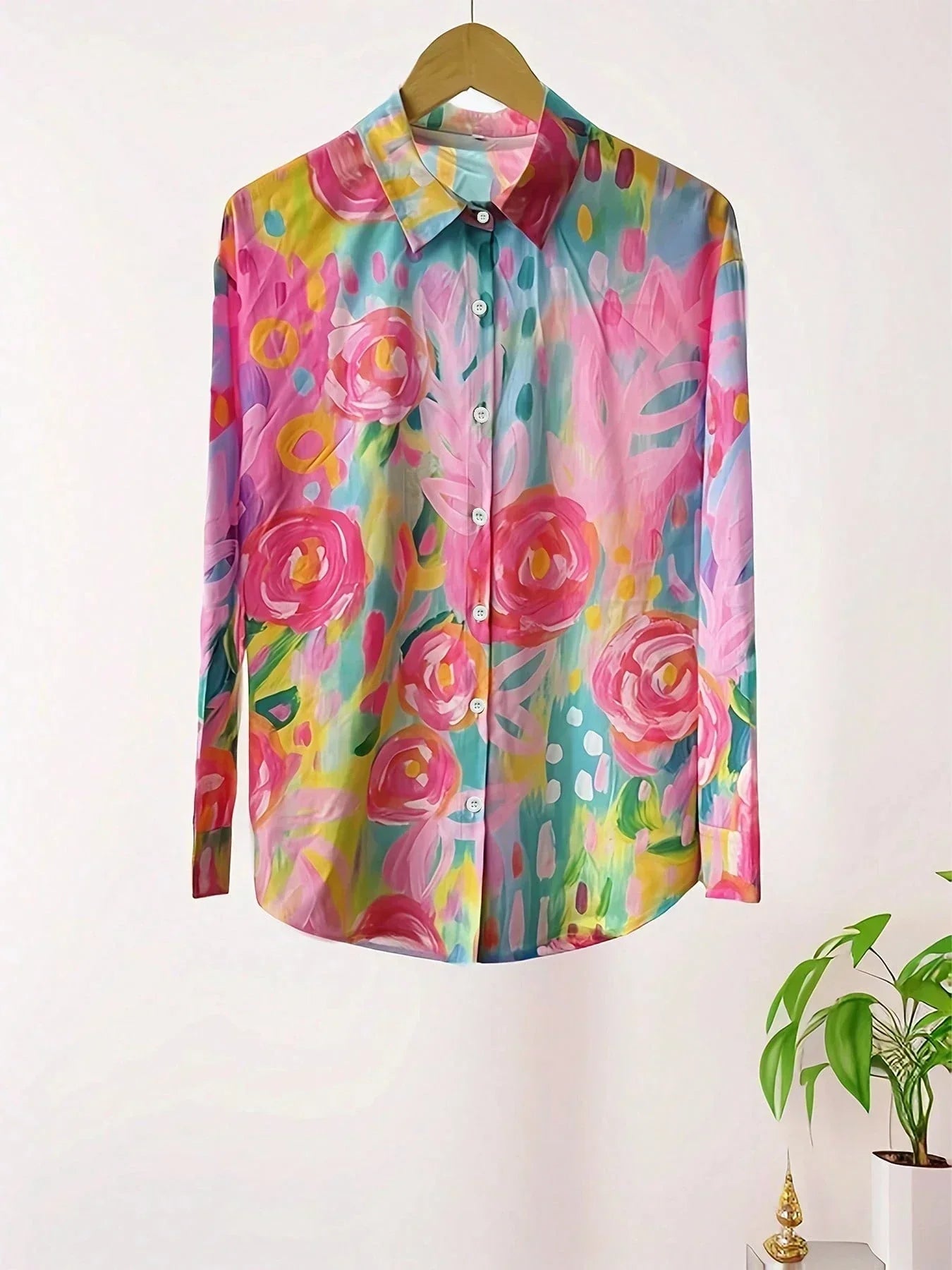 Colourful blouse with playful print