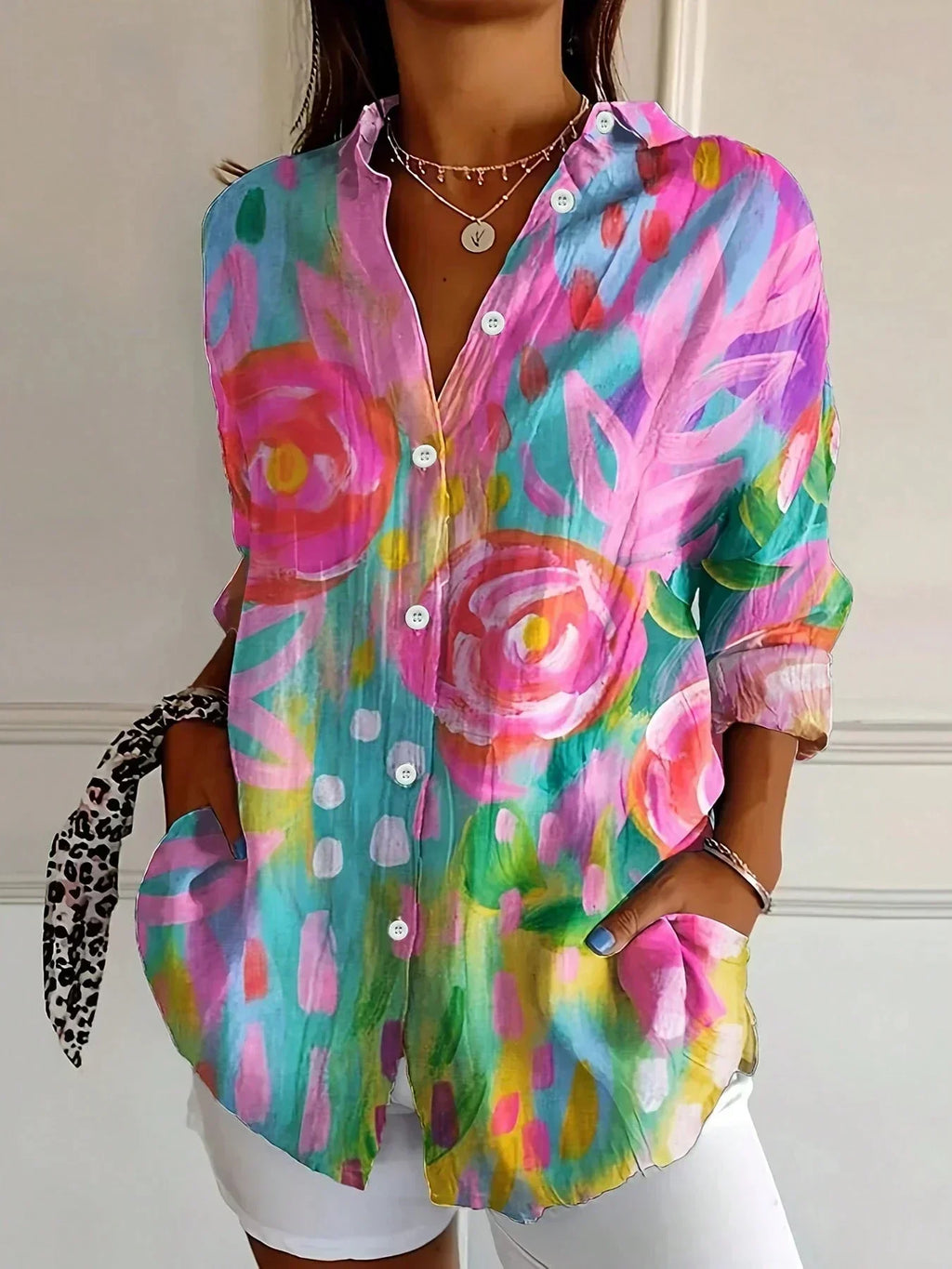 Colourful blouse with playful print