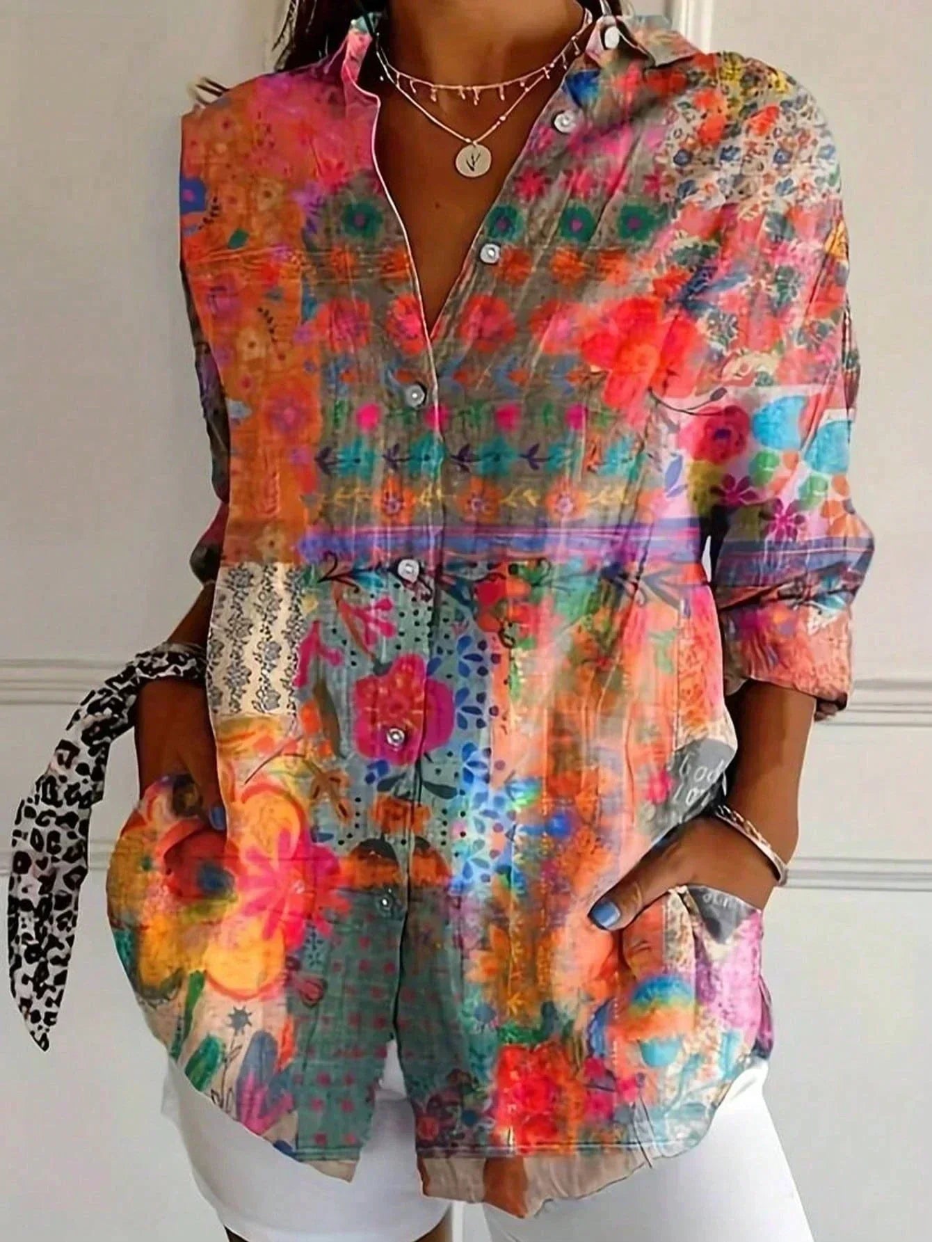 Colourful blouse with playful print