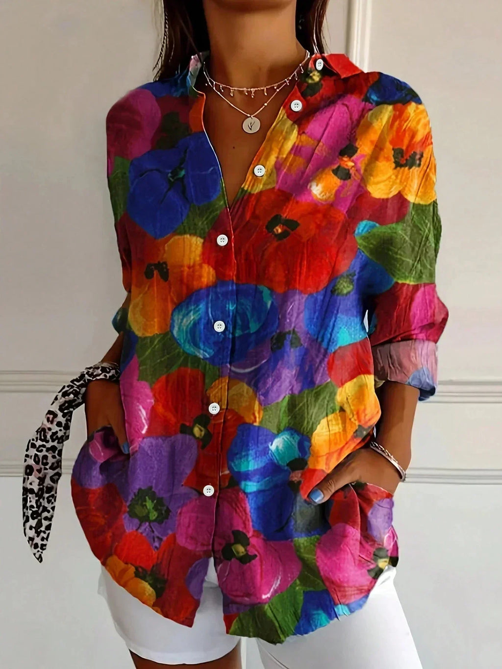 Colourful blouse with playful print