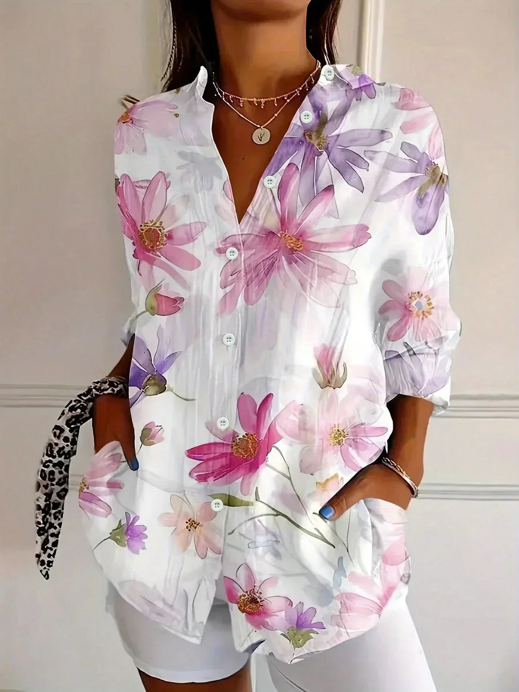 Colourful blouse with playful print