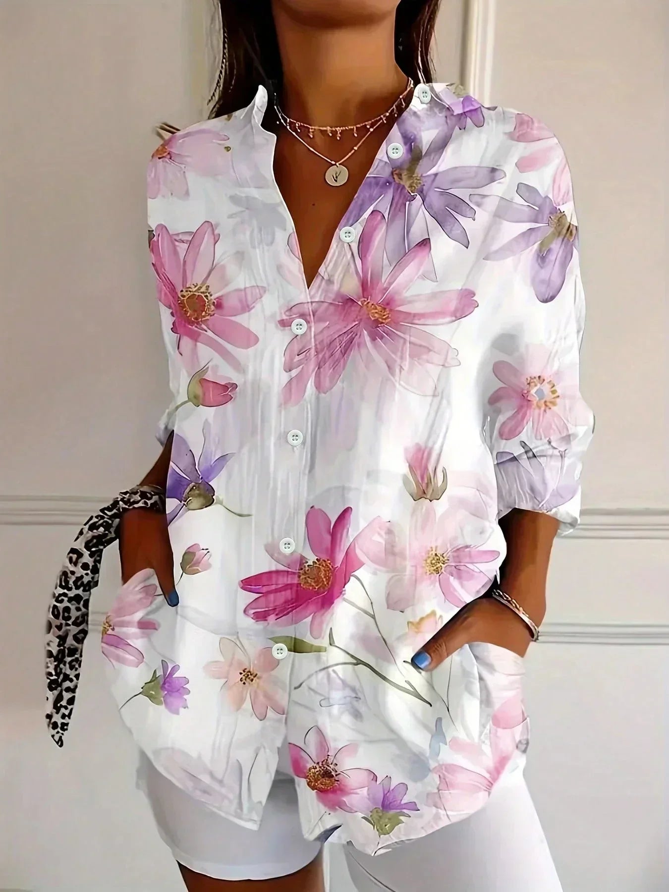 Colourful blouse with playful print
