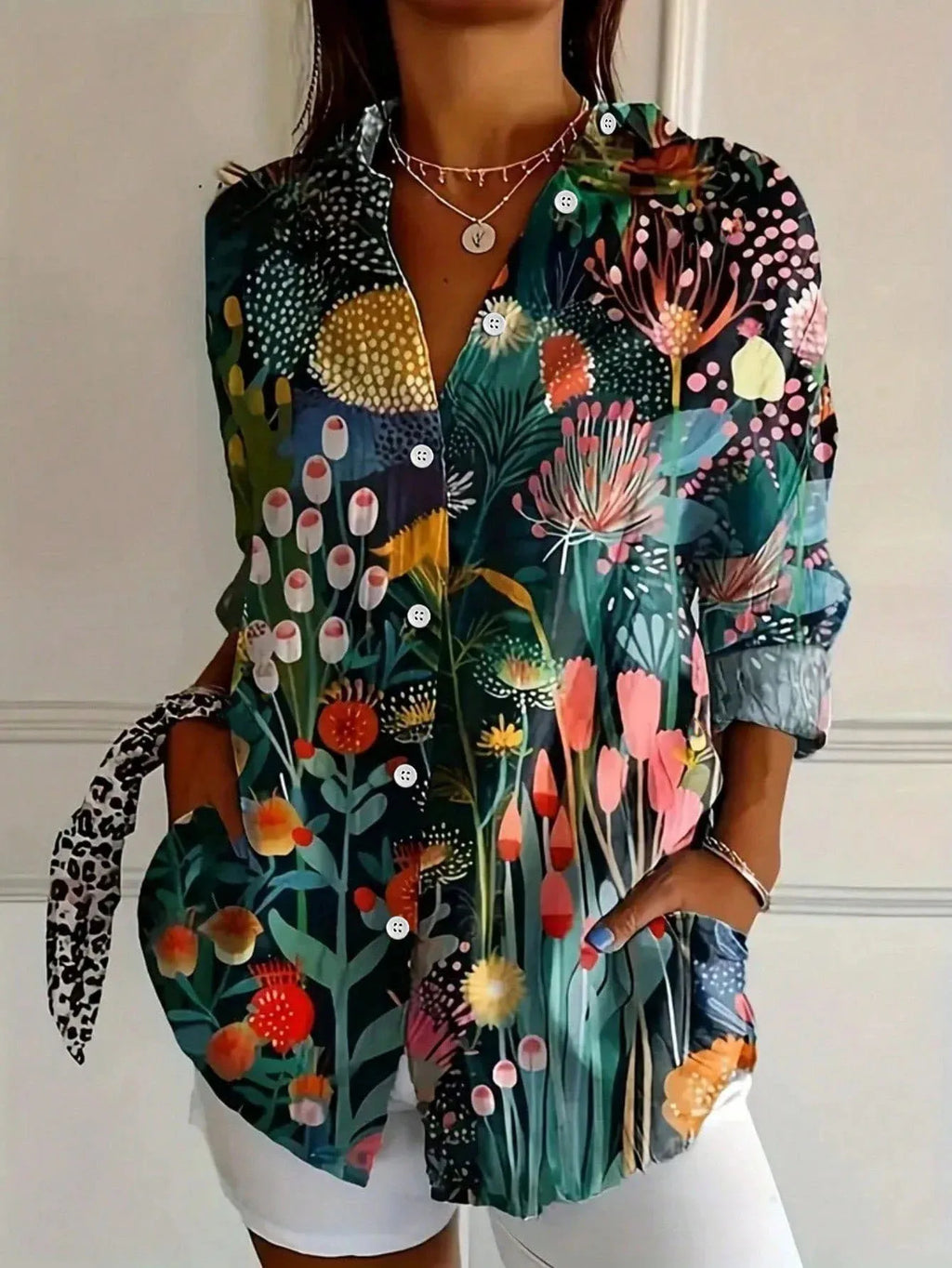 Colourful blouse with playful print